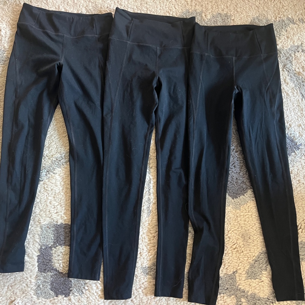 Three pairs of Girlfriend Collective Black Leggings
